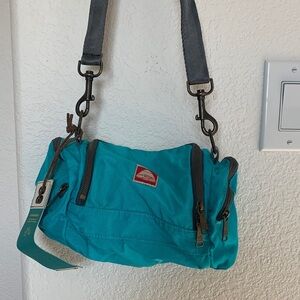 Jansport Swinger Turquoise Crossbody Bag with Gray Strap